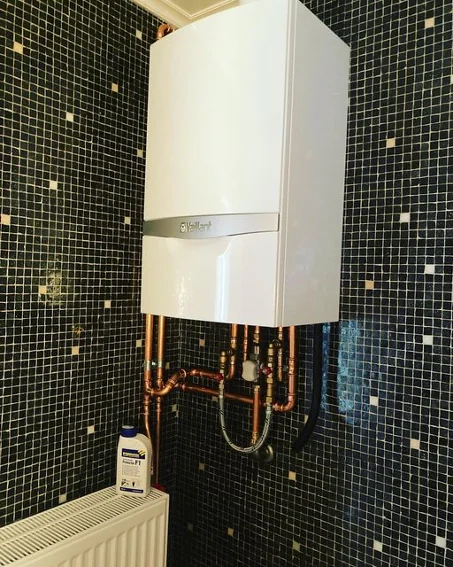 Installation d'une chaudière à gaz murale à Dottignies